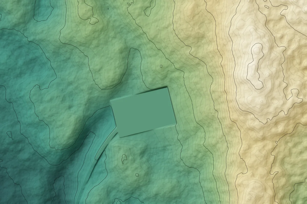 Elevation model after grading, showing a level building pad and driveway